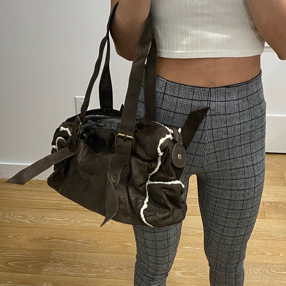 UO sherpa lined mini duffel